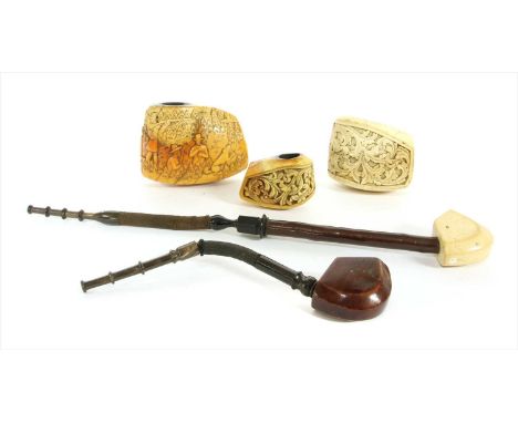 A meerschaum pipe bowl,c.1890, Norwegian, carved with scenes of shooting rabbits and ducks, stamped 'G. Larsen',11cm wide, tw