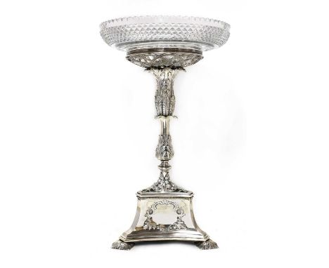 A Victorian silver epergne,by C... B..., London 1860,with applied leaf decoration, on a triform base and three leaf feet, wit