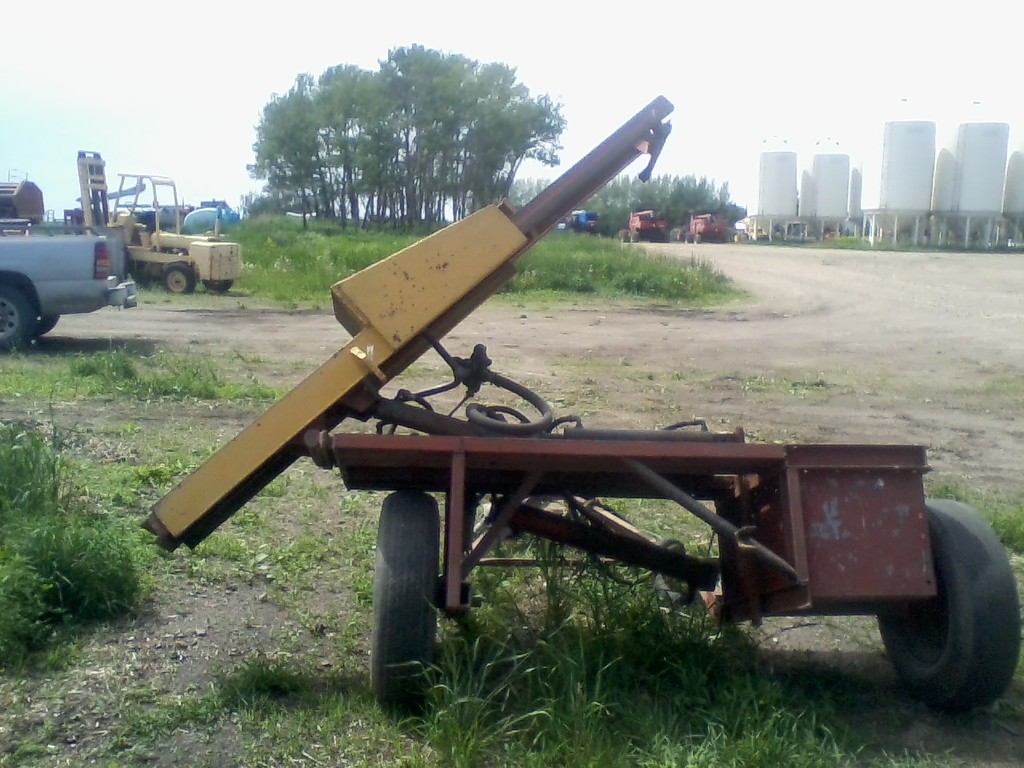 Shop built custom PTO driven post hole pounder