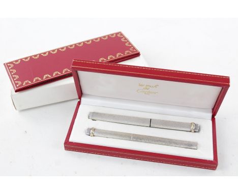 2 x Cartier silver tone fountain pen with matching ballpoint In original box
