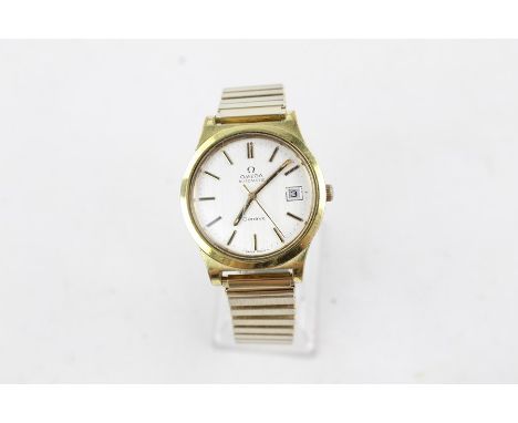 Vintage Gents Omega Geneve gold tone wristwatch automatic working
