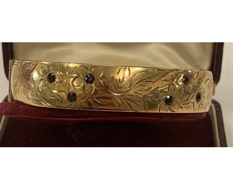 Vintage stamped 9ct rolled gold and garnet Set bangle with engraved floral design