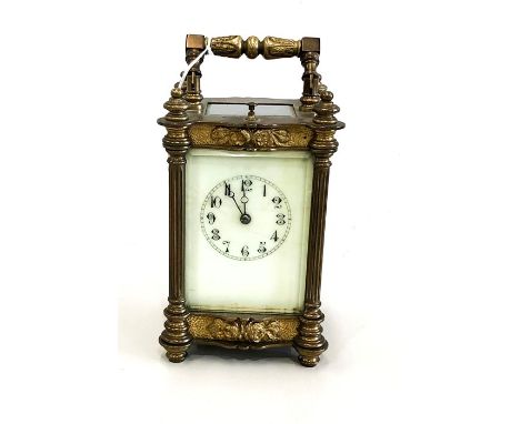 Ornate repeater carriage clock winds and ticks but no warranty given strikes on hour and half  height not including handle 16