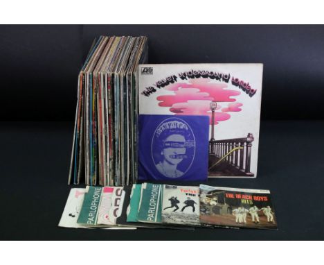 Vinyl - Over 30 mainly rock LPs and 12 7" singles &amp; EPs to include The Velvet Underground x 3, Lou Reed, The Doors, Van M