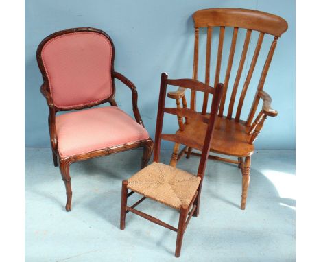 A beechwood stick-back country chair, rush--seated ladder-back chair and a pink-upholstered carver chair