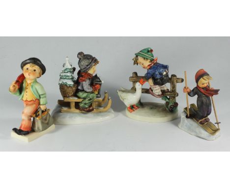 Four Goebel Hummel porcelain figures: 6" Ride into Christmas 396, 5" Skier 59, 6" Merry Wanderer and 6" Barnyard Hero 195/I (