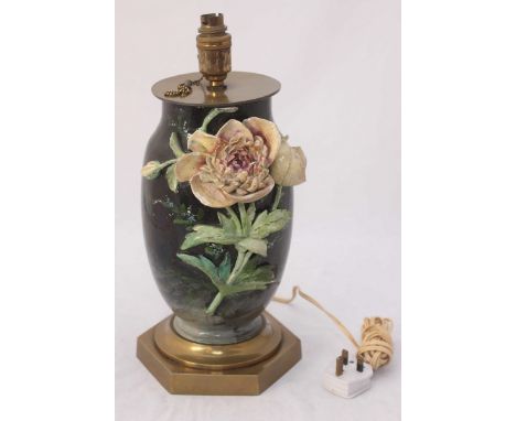 A brass-mounted floral pottery table lamp, raised on hexagonal brass pedestal base. 40cm high including bulb fitting.