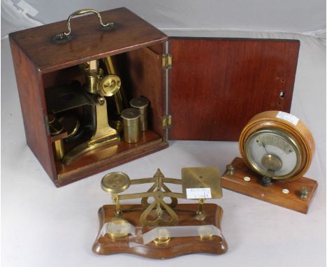 A 19th century lacquered brass microscope in walnut storage box, by H. Hughes, Fenchurch Street, together with a set of brass