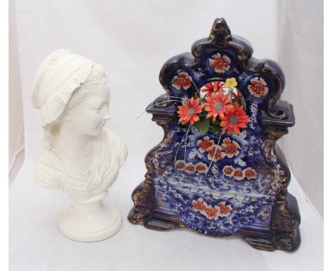 A white-painted ceramic bust of a young girl wearing a bonnet, on socle base, 44cm high, together with a large Victorian pott