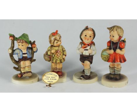 Four Goebel 'Hummel' porcelain figures: Apple Tree Boy 142/ 3/0, I Bought You a Gift 479, School Boy 82 2/0, and School Girl 