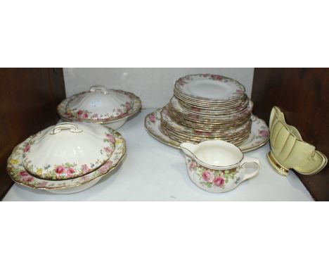 SECTION 13. A 23-piece Royal Doulton 'English Roses' pattern part dinner service, comprising of plates, tureens and a gravy b