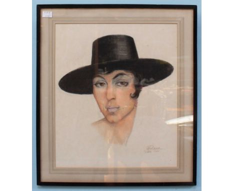 A. Pacheco (20th century) Portrait study of a lady wearing brimmed hat, signed and dated 1908? crayon and charcoal on paper. 
