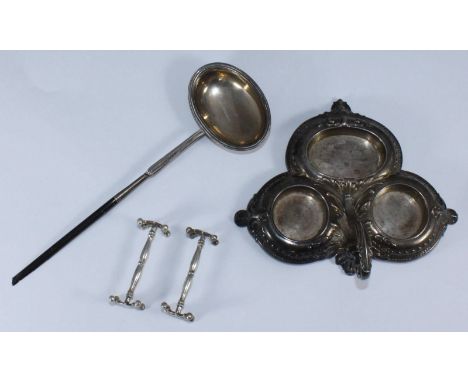 A silver three section cruet stand by James Dixon & Sons, together with a Georgian silver toddy ladle (AF) and two knife rest
