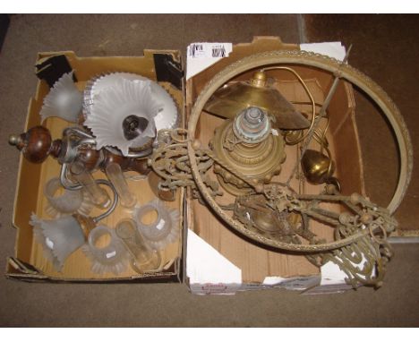 A three light turned wood hanging light with metal scroll arms and frosted shades, a late 19th Century brass rise and fall ce