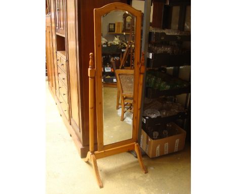 A pine cheval mirror.