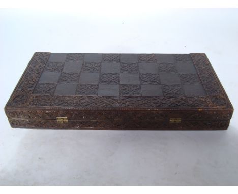 A resin folding backgammon/chess board. 