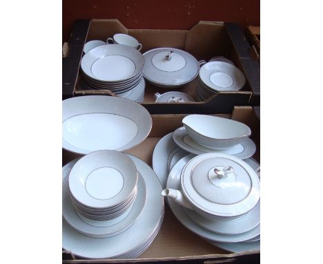 A Noritake Damask pattern eight setting extensive dinner and tea service comprising eight dinner plates, eight medium plates,