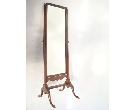 An early 20th Century mahogany cheval dressing mirror. 
