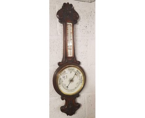 1920'S CARVED OAK BANJO STYLE ANEROID BAR &amp; THERMOMETER (2FT 10 LENGTH)
