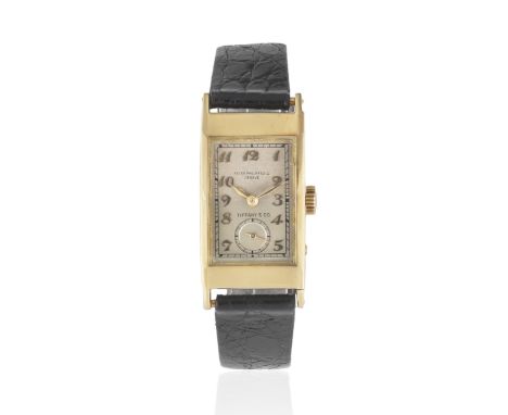 Patek, Philippe &amp; Co, Geneve. A rare double signed 18K gold manual wind rectangular wristwatch retailed by Tiffany &amp; 