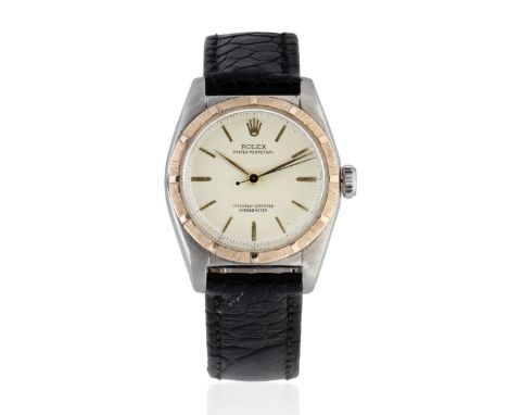 Rolex. A mid-size stainless steel and gold automatic bubbleback wristwatchModel: Oyster PerpetualReference: 6050/5015Date: Ci