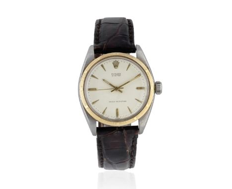 Rolex. A stainless steel and gold manual wind wristwatchModel: Oyster Shock-ResistingReference: 6426/6427Date: Circa 1961Move