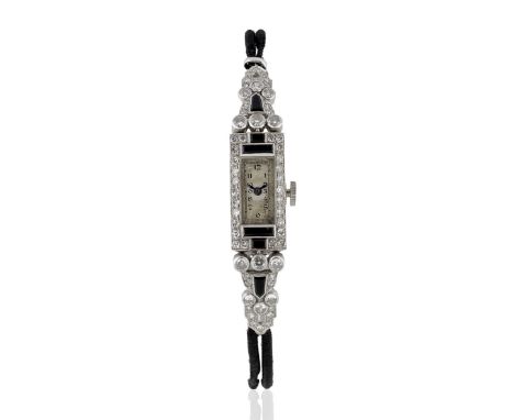 A lady's platinum diamond and onyx set manual wind rectangular cocktail wristwatchDate: Circa 1930Movement: 15-jewel manual w