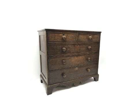 Early 19th century oak and mahogany banded chest, two short and three long drawers, shaped apron on bracket feet, W108cm, H10