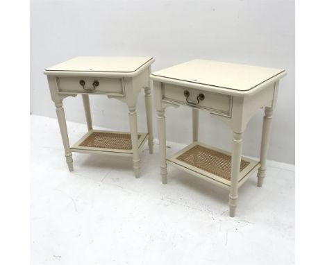 Pair Laura Ashley cream finish bedside lamp tables, single drawer, turned supports joined by canework undertier, W51cm, H62cm