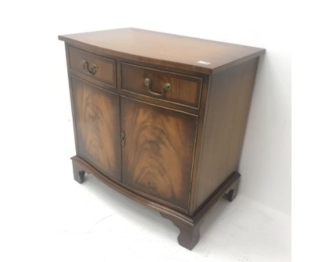 Reproduction Bevan Funnell mahogany serpentine front side cabinet, two drawers above two cupboards, shaped bracket supports, 