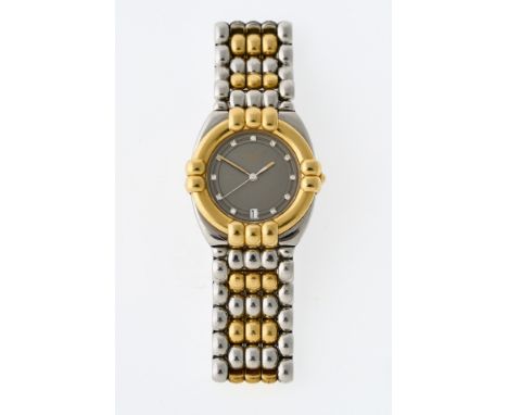 Gehäuse in Stahl/Gold, ø 33 mm. Champagnerfarbenes Zifferblatt  mit Brillantindizes, Goldzeiger, Datum. Goldlünette,  verschr