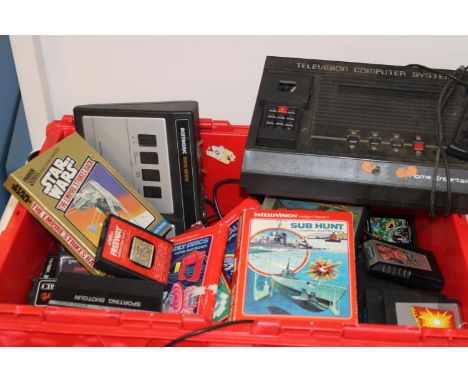 A box of vintage computer game consoles &amp; games (un-checked) 