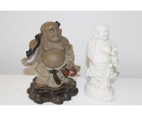 Two ceramic Buddha figurines 22cm tall 