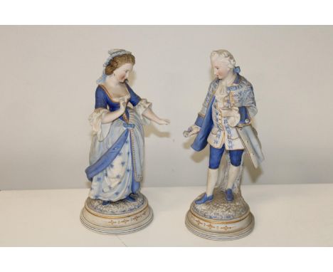 A pair of late 19th century Dresden ceramic figures 27cm cm tall 