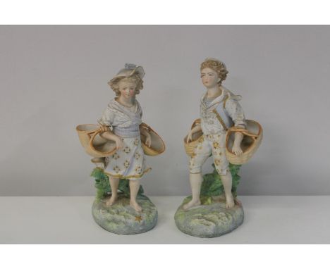 A pair of late 19th century Dresden ceramic figures 34 cm tall