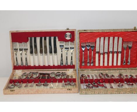 Two boxed sets of vintage cutlery 