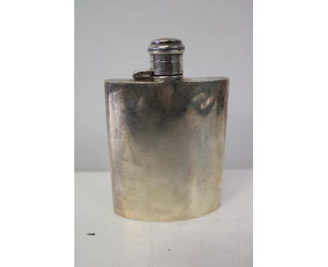 A hallmarked silver hip flask 177grams 