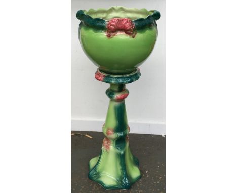 A large ceramic planter on stand, 33" high 