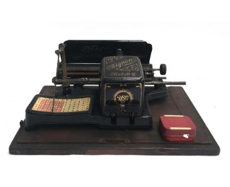 An early 20th century German AEG Mignon Modell 2 USG index typewriter, in original case 