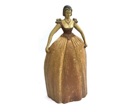 A painted tin fire screen in the form of a lady with voluminous skirt, 77cmH