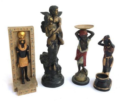 A cast metal enamelled figure of a boy carrying tray; a similar ceramic figure; a cast metal figure of two angels; and a cera
