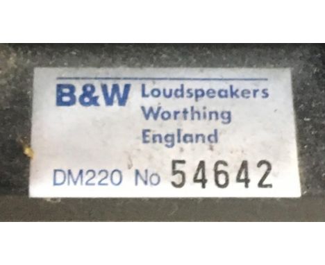 A pair of B&amp;W DM220 speakers, together with a pair of speaker stands 