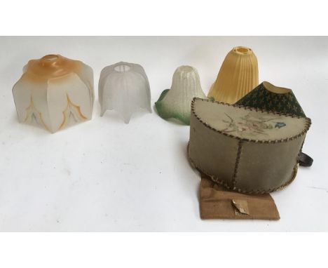 A number of vintage lampshades, several glass, some plastic, one leather 