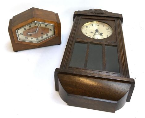 An Art Deco mantel clock; together with an oak cased wall clock with eight day striking movement 