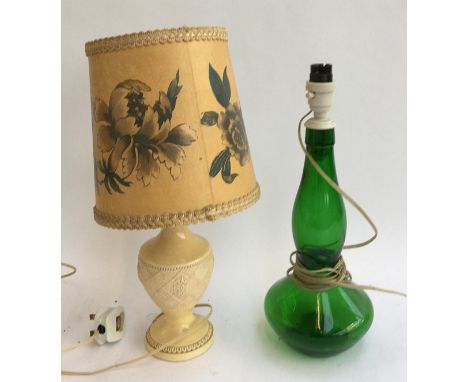 A green glass table lamp, 38cmH to top of fitting; together with one other 