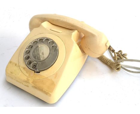 A vintage rotary dial telephone 
