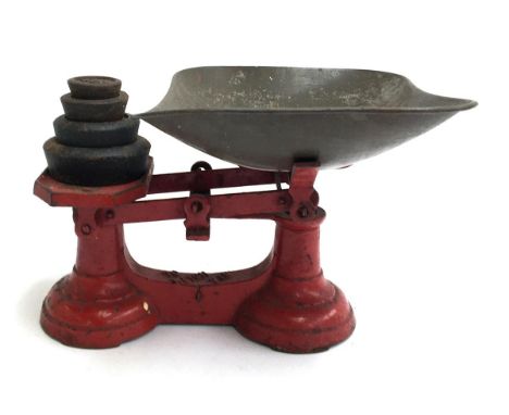 A set of vintage scales, with weights up to 2 lbs 