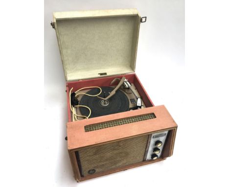 A Dansette cream and pink portable record player, with Garrard turntable 