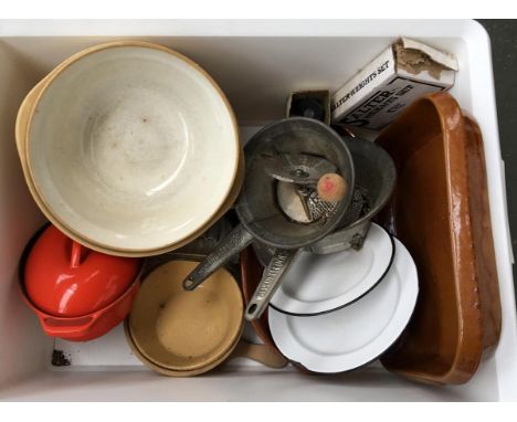 A box of various kitchenalia, to include Green's mixing bowls, cast iron casserole pot, several jelly moulds, oven dishes, se