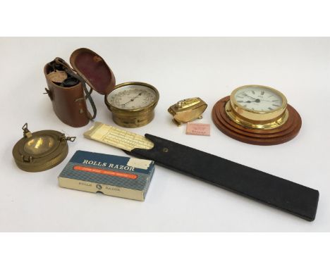 A mixed lot to include Ronson table lighter, barometer, ports wall clock, slide rule in case, Prinz 8x30 binoculars (with tic